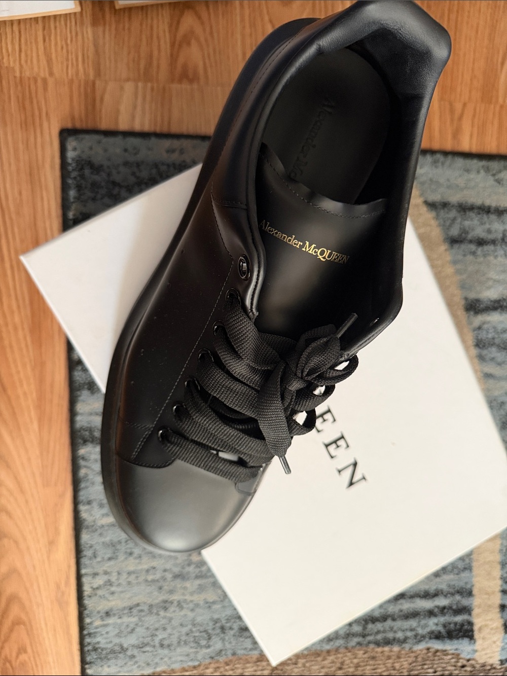 Alexander McQueen Black Leather Low-Top Sneaker with Gold Logo